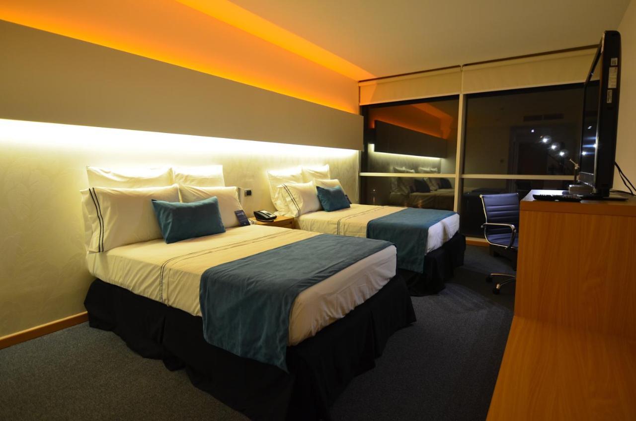Hotel Enjoy San Antonio Ruang foto